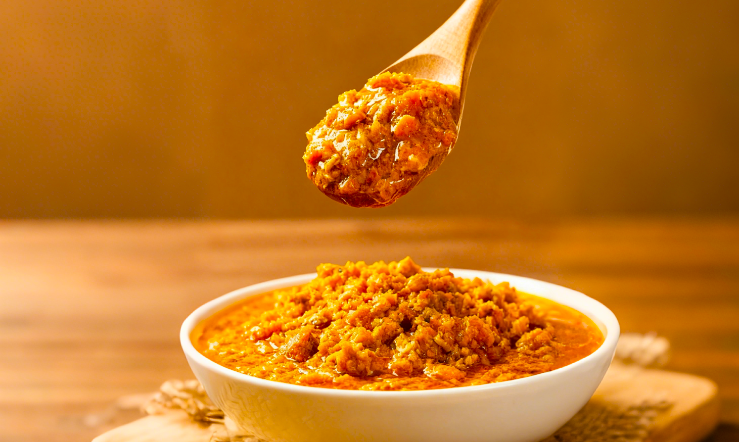 Wishwill lion’s mane vegan crab-flavored sauce, in a bowl and on a spoon